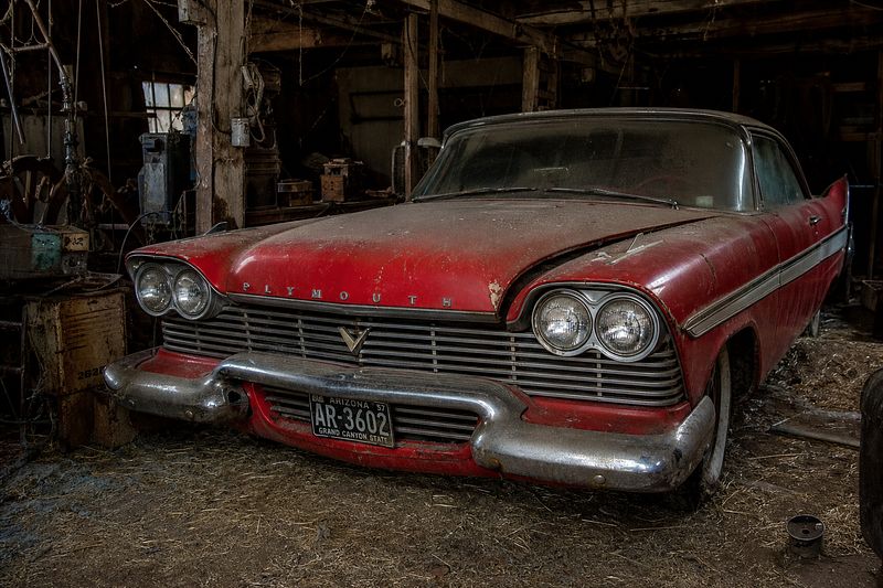 Red 1957 Plymouth in a Garage